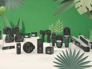 Full range of Bosch sustainable measuring tools styled on a green background.