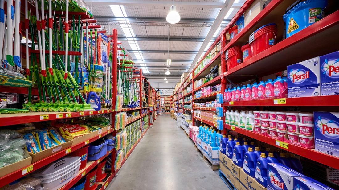 An aisle in a Bunnings store filled with cleaning products.