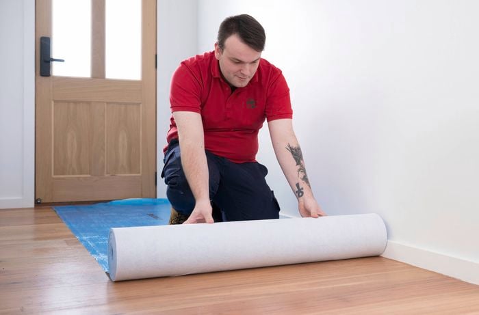 Prepare floor with drop sheets