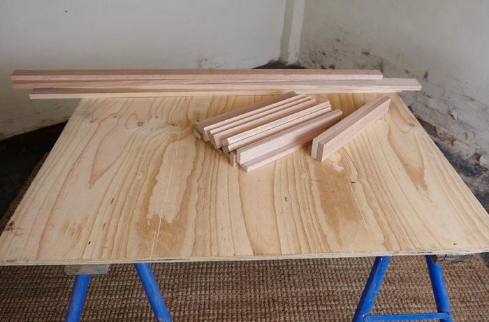 Pieces of timber laid out on a workbench