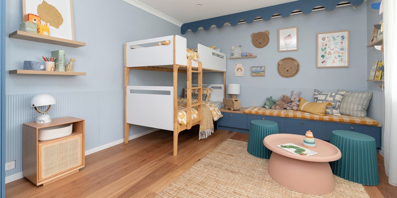 Blue kids bedroom with bunk beds.