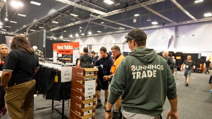 Customer shopping at NZ trade expo for work boots