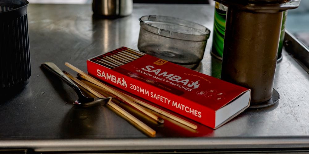 used
  Samba Matches (0255315) sitting on bench in camp kitchen