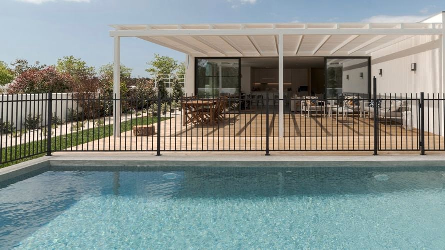 Square tube picket fence surrounding pool