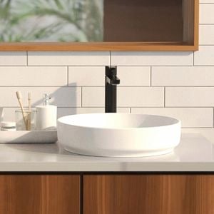 Bathroom With Black matte bathroom fittings, White basins and a timber floating vanity