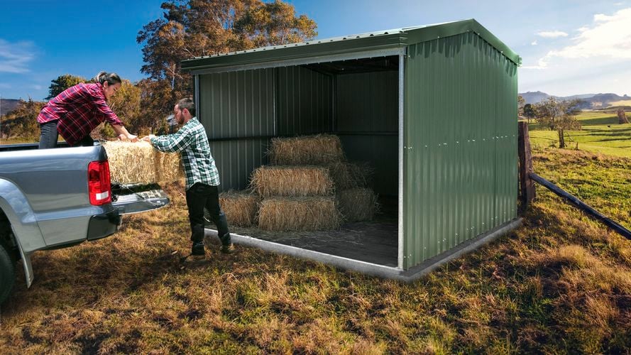people working in farm shed