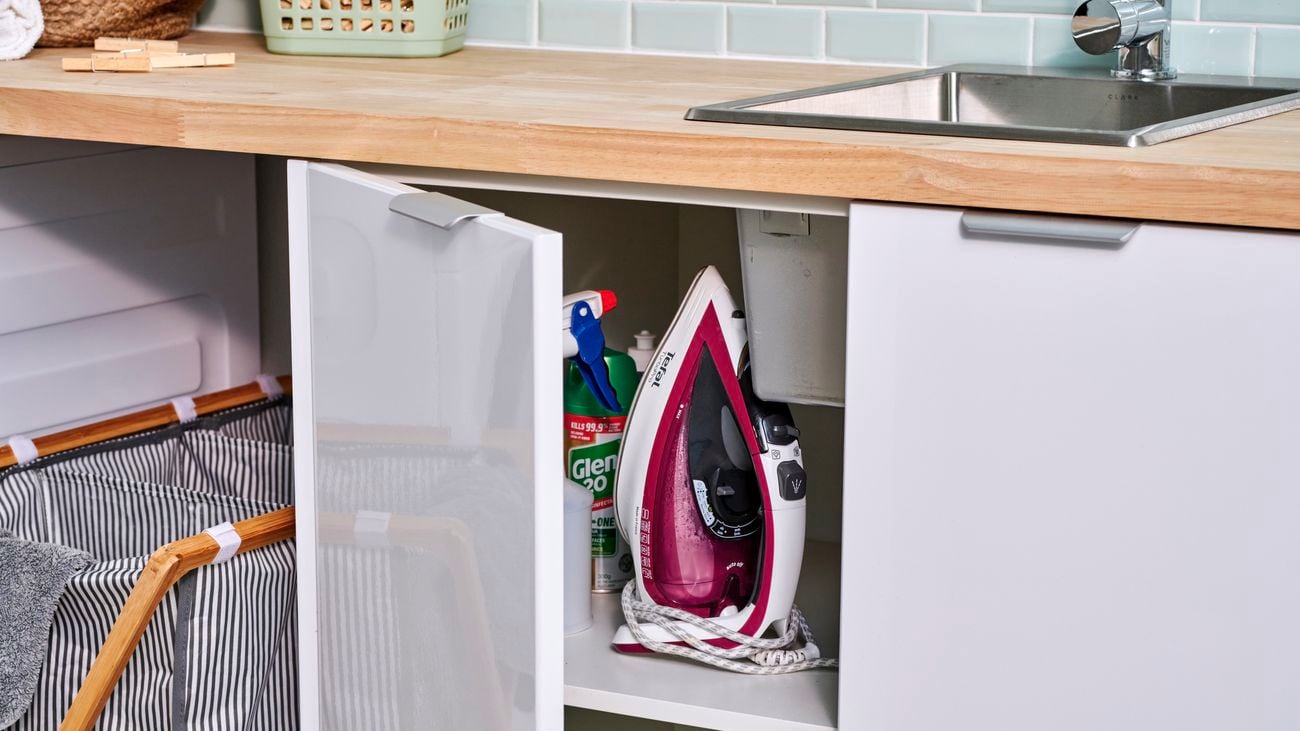 Close up of cabinetry under sink