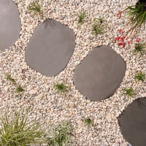 Creating
  a contemporary pathway with natural character is easy with our Bluestone
  Stepping Stones, paired with mixed pebbles and plants. I/N: 0280562