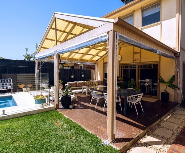 Outdoor timber decking area with outdoor dining table