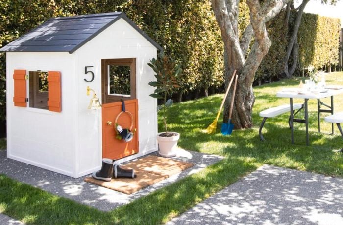 Backyard with cubby house and kids trestle picnic table