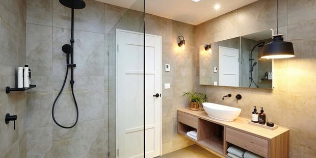 Modernised bathroom with warm tones.