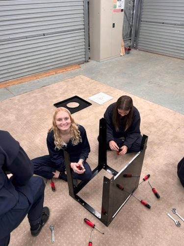 trade teens prog - teens participating in activity at store