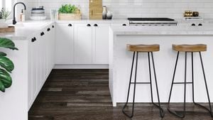 Kitchen with white benchtops, marble benchtop and white tile splashback.