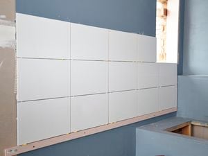 DIY Step Image - How to tile a bathroom wall . Blob storage upload.