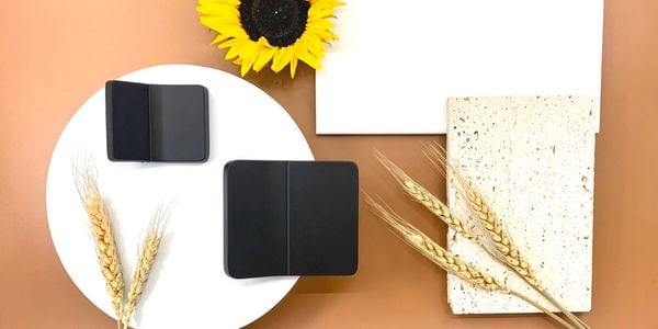 Black colour hardware sample with wheat and a sunflower.