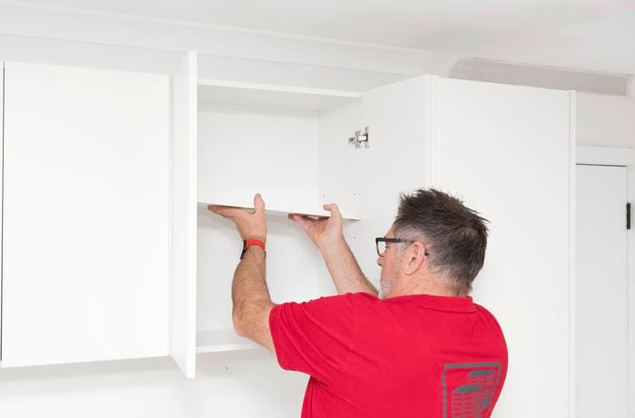 Install the shelf in the cabinet