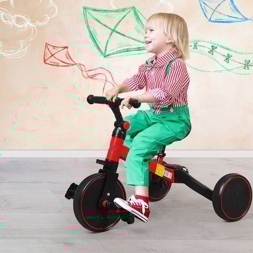 Child riding tricycle hotsell