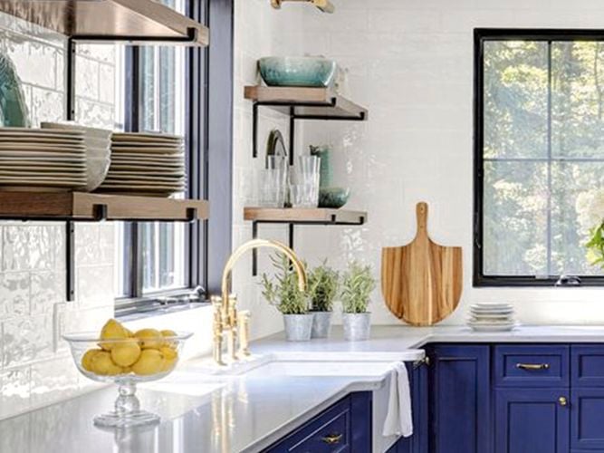 Blue kitchen with white benchtops