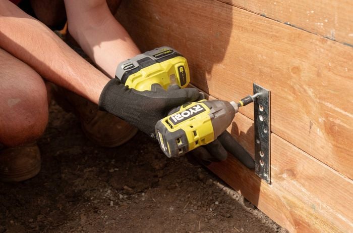 Secure galvanized metal straps inside the structure for longer garden beds