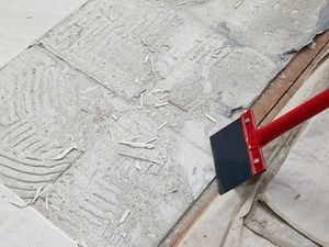 DIY Step Image - How to remove floor tiles . Blob storage upload.