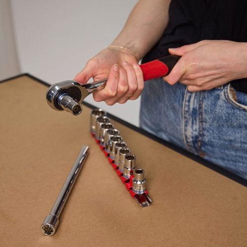 Ratchet being used by picking up a socket