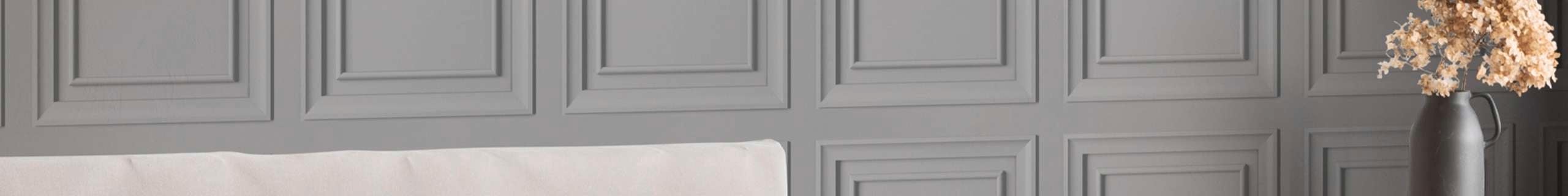 Art decor patterned wallpaper in grey with vase and flower.