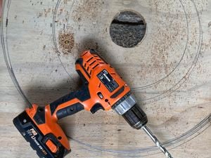 A drill used to drill into plywood