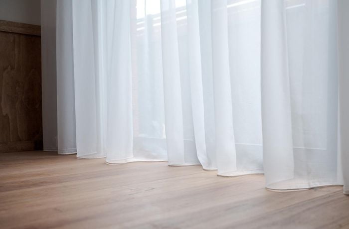 sheer cutains with timber floors