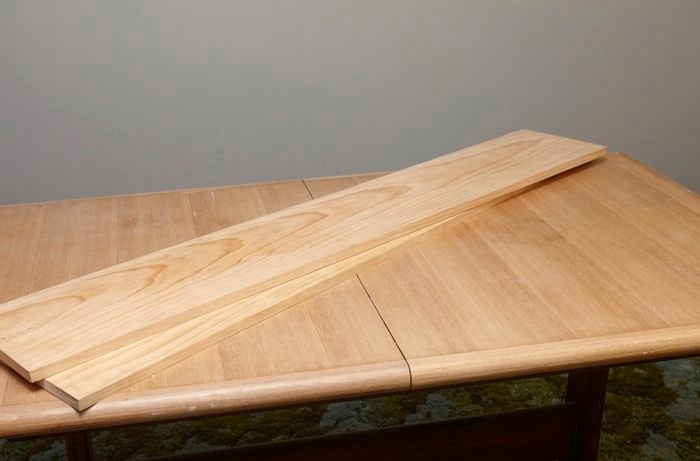 Two wide pine boards on a table