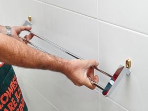 DIY Step Image - How to install bathroom accessories into tiles . Blob storage upload.