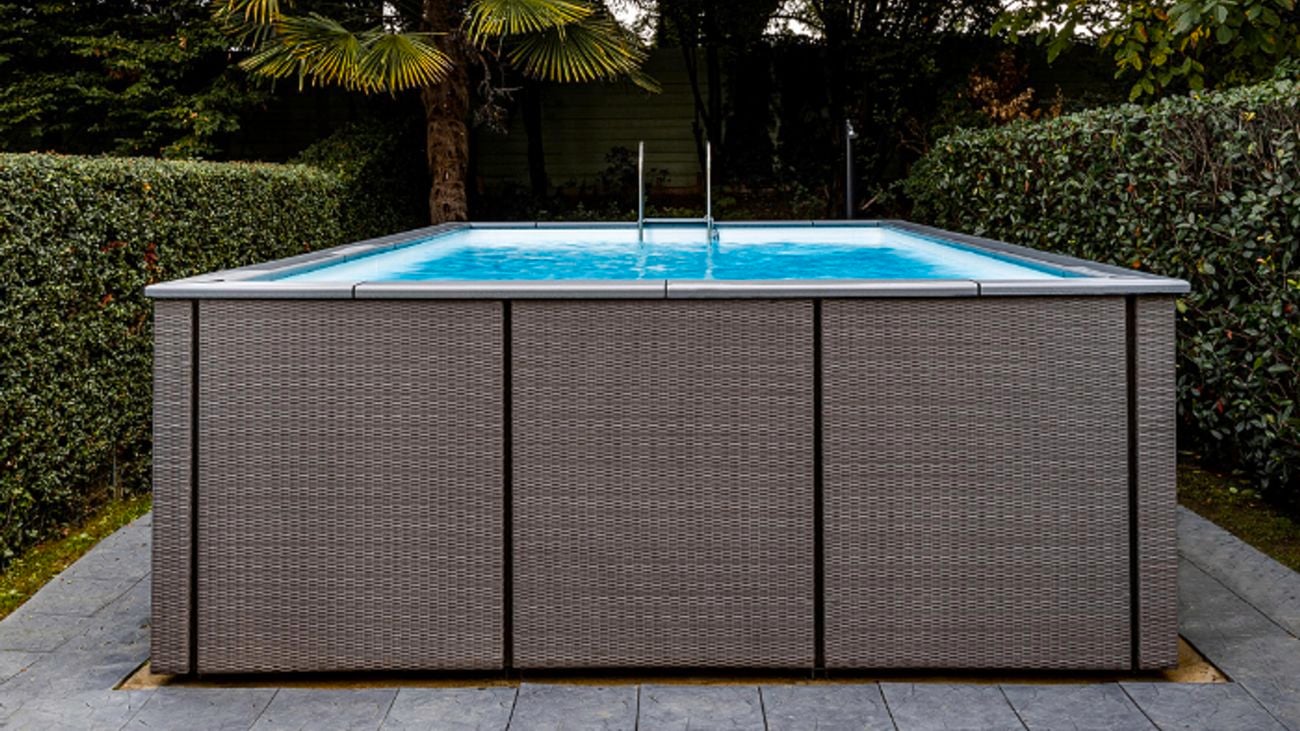 An above ground pool in a backyard