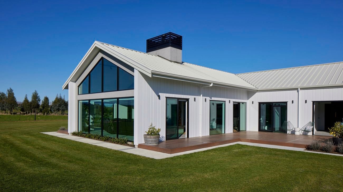 white timber house with large front windows