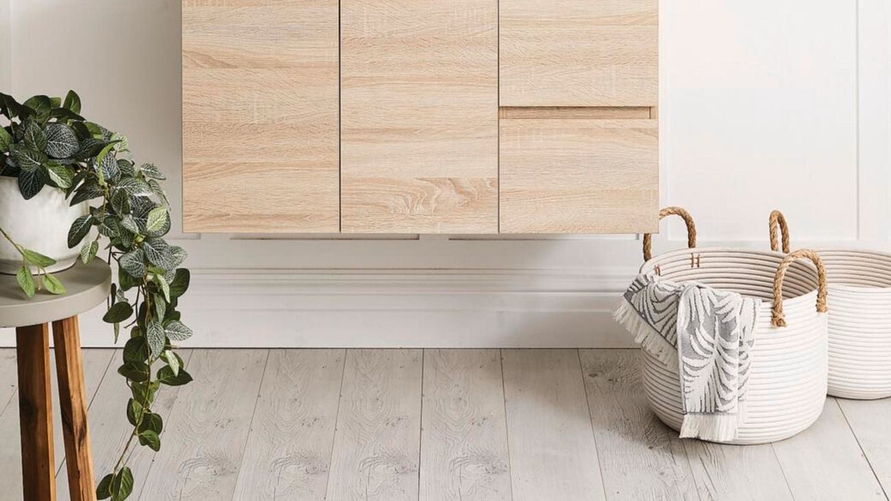 Scandi style light, white bathroom featuring fish scale tiles