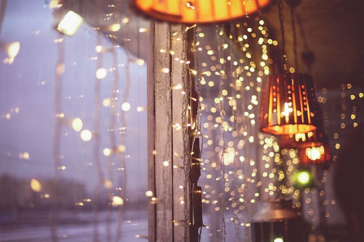 Fairy lights hanging over windows