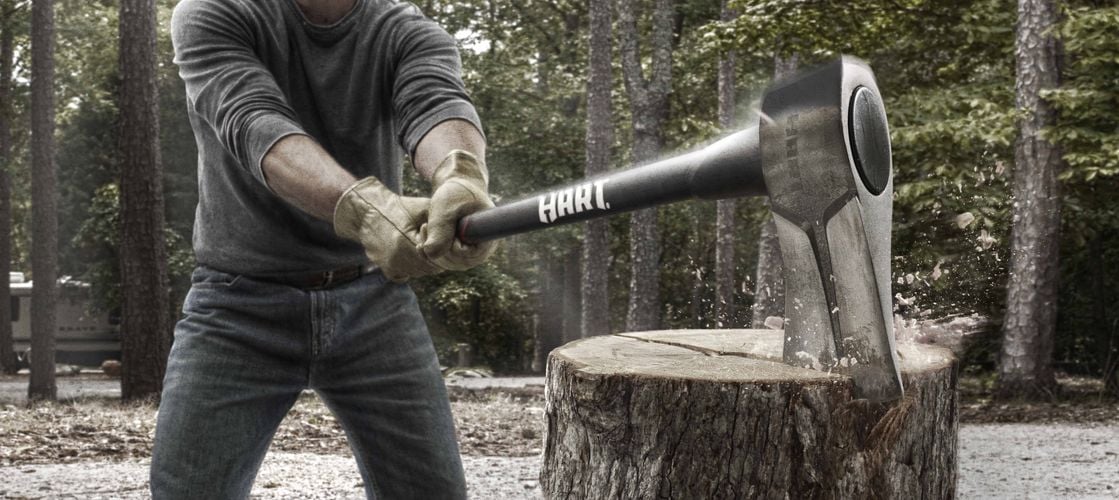 An axe being driven into a chopping block