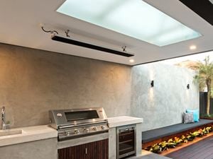 Outdoor entertaining area with strip heater