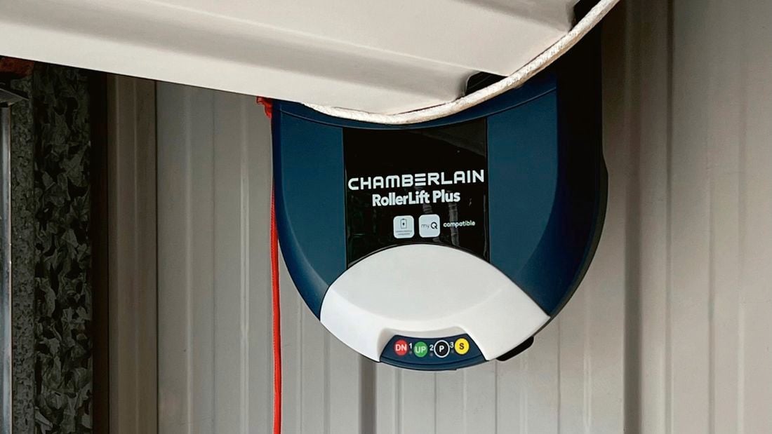 The top of a Garage roller door with the motor