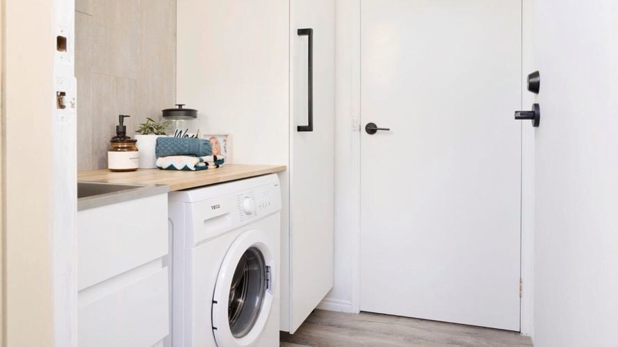 washing machine with white cabinets