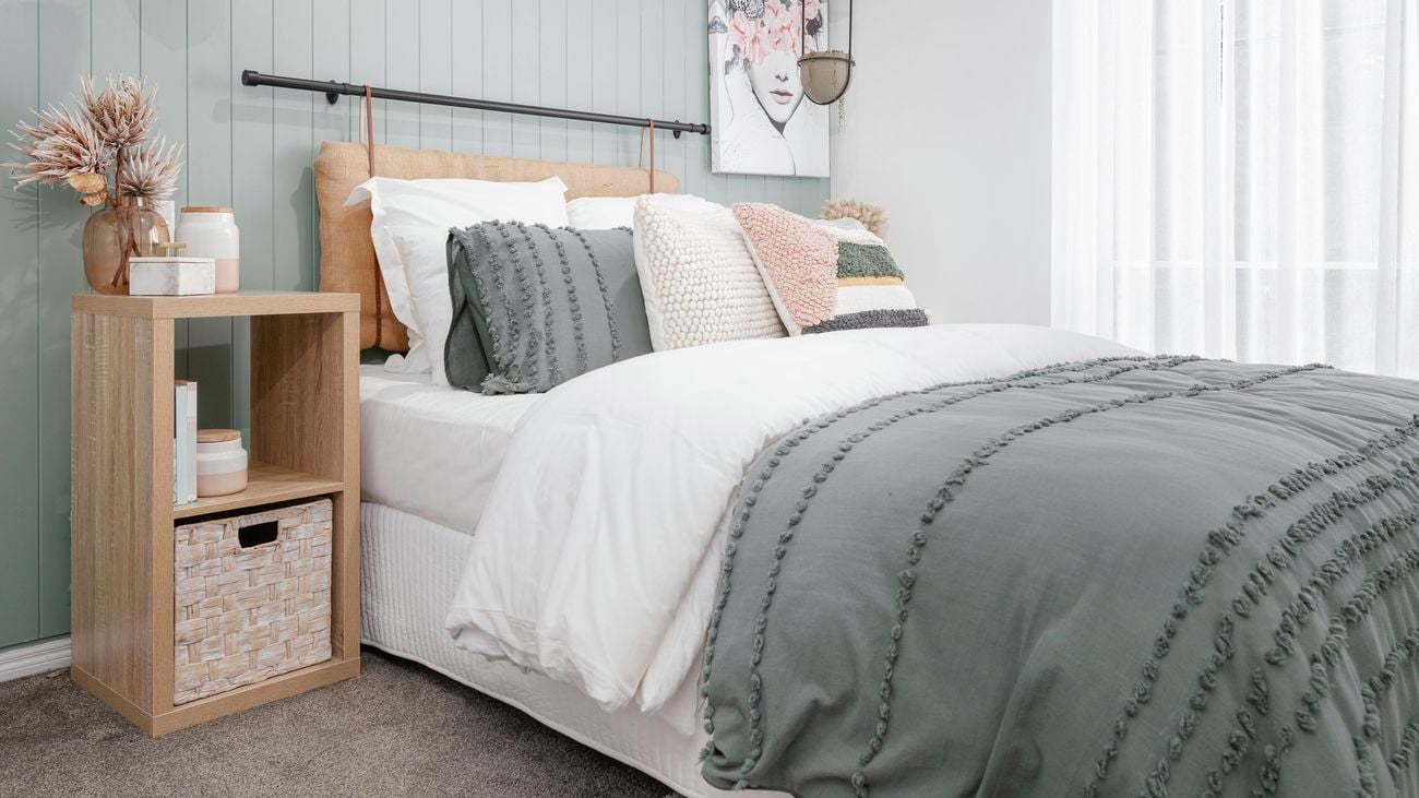 Bedside table with cube storage underneath.