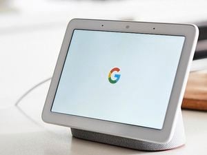 White iPad in a kitchen.