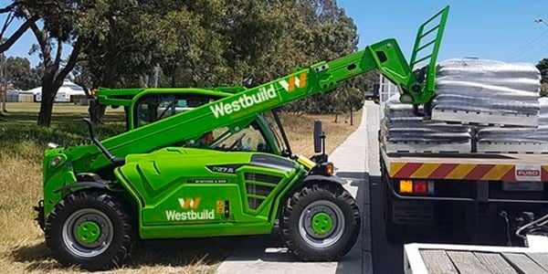 A Westbuild forklift lifting Westbuild products.