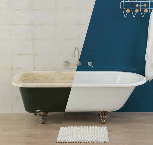 A freestanding bath half-cleaned to demonstrate the effectiveness of a cleaning product, against a wall half-painted to match