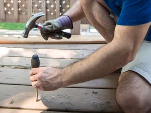 Man repairing the deck