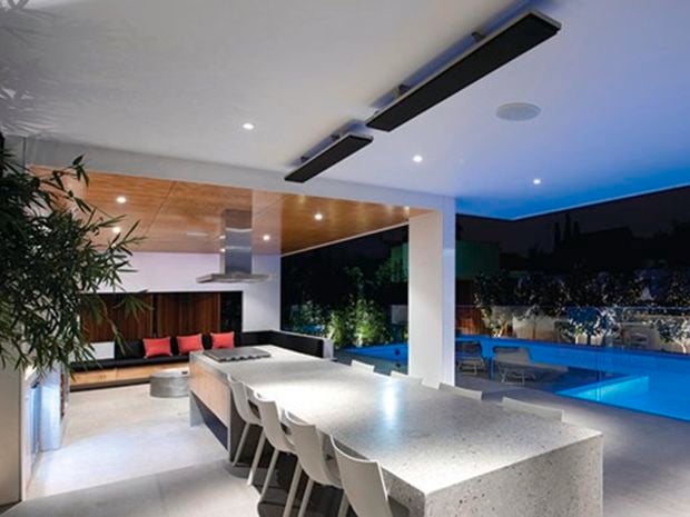 strip heater about alfresco dining area with table and chairs