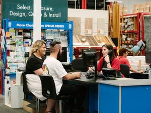 Customers being served at a Bunnings Special Orders desk.