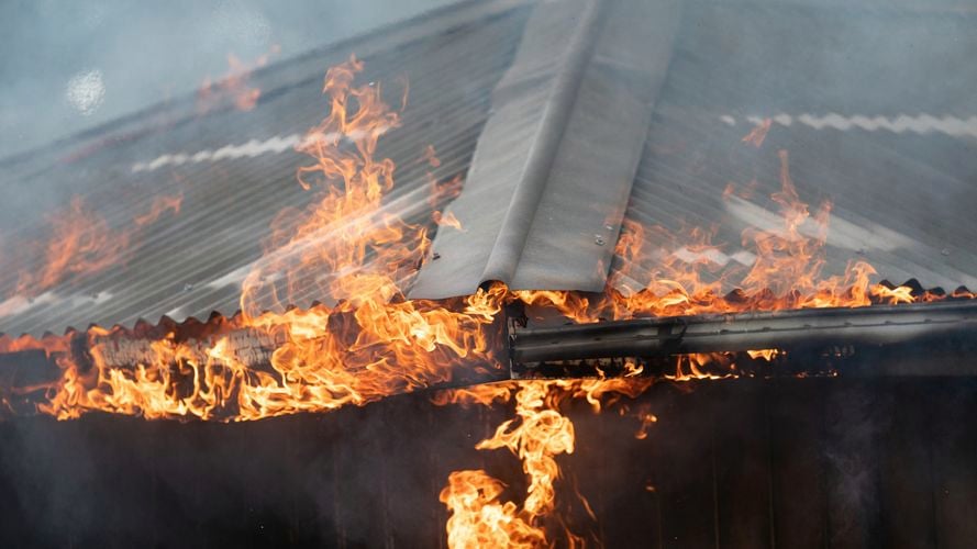 Fire quickly engulfs roofs when not treated with FIRECOAT.