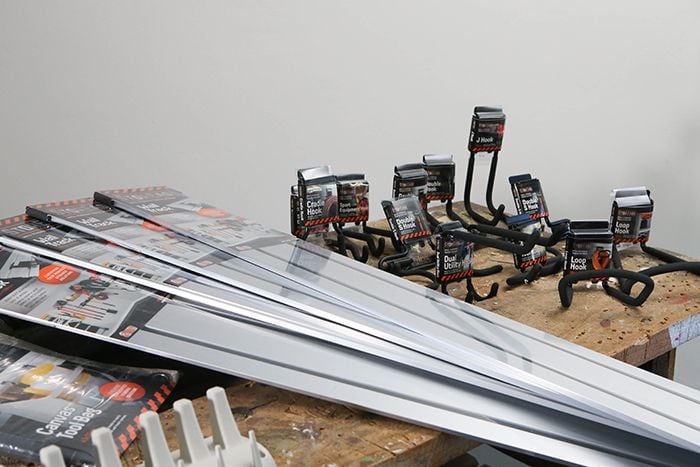 Range of StorEase rails and hooks in their packaging