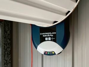 The top of a Garage roller door with the motor