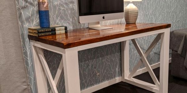 A rustic D.I.Y. timber desk with computer
