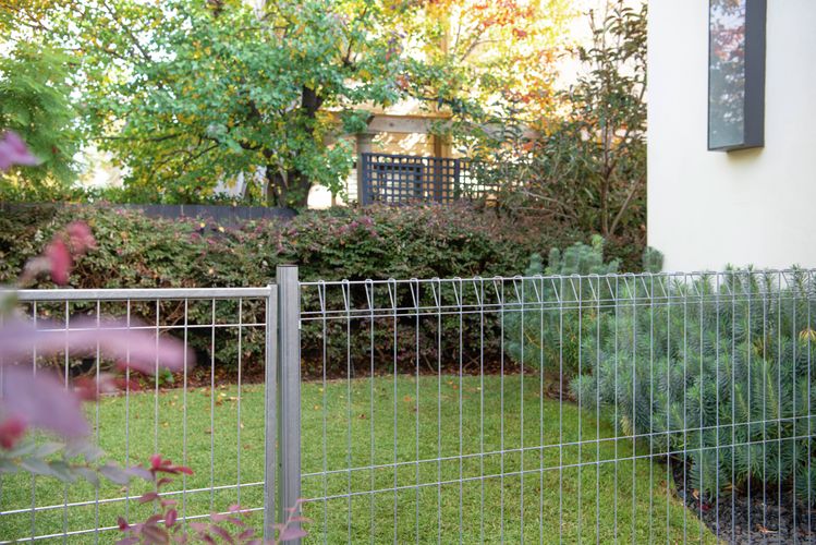 Rapid Products fencing and gate solutions installed in a residential outdoor setting
